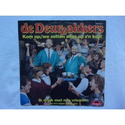 De Deurzakkers - Kom op we zetten alles op zijn kop